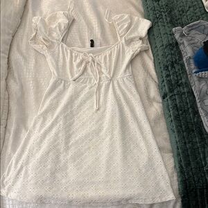 H&M White eyelet mini dress with front cut out
